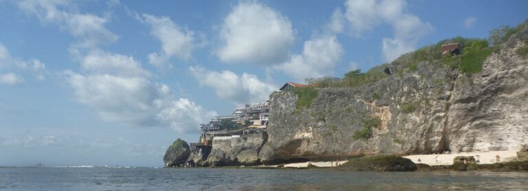 View of the shops on the cliffs of Suluban Beach